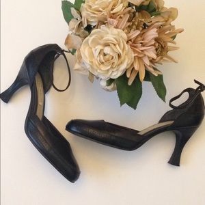 Black and brown wing tip dressy heels